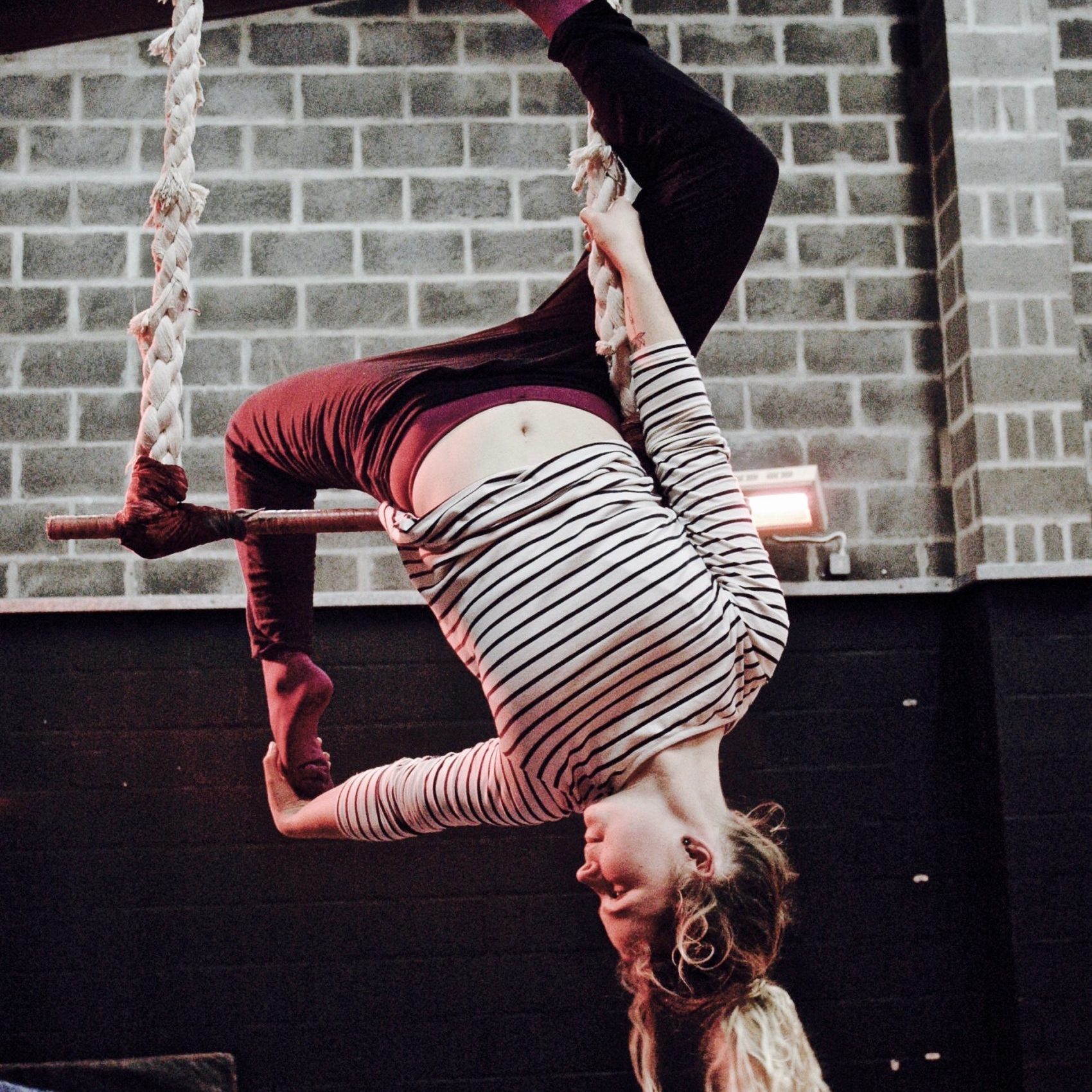 Girl on trapeze